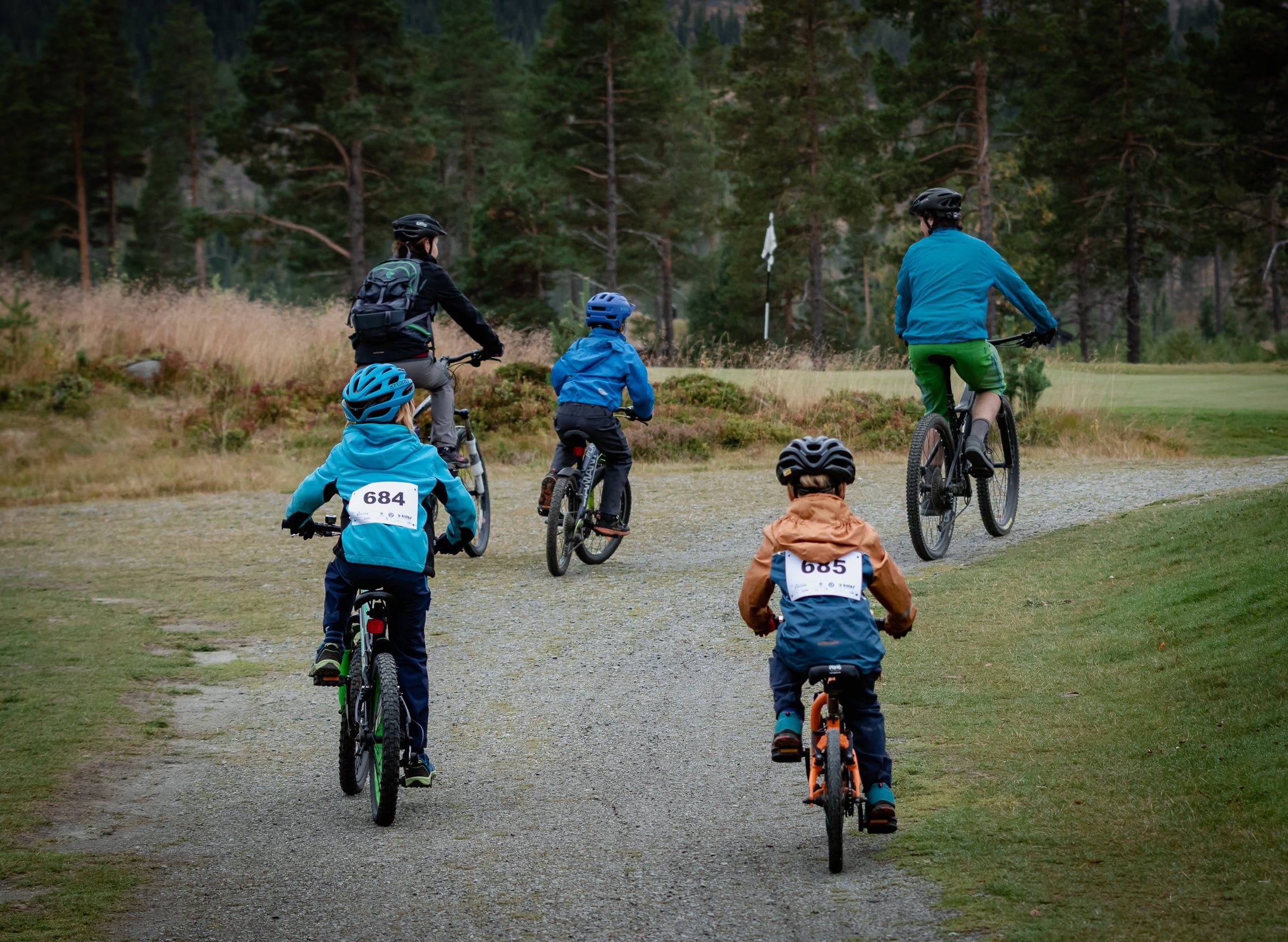 children and parents cycling