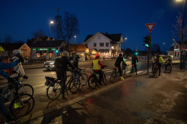 cyclist riding to work in the winter